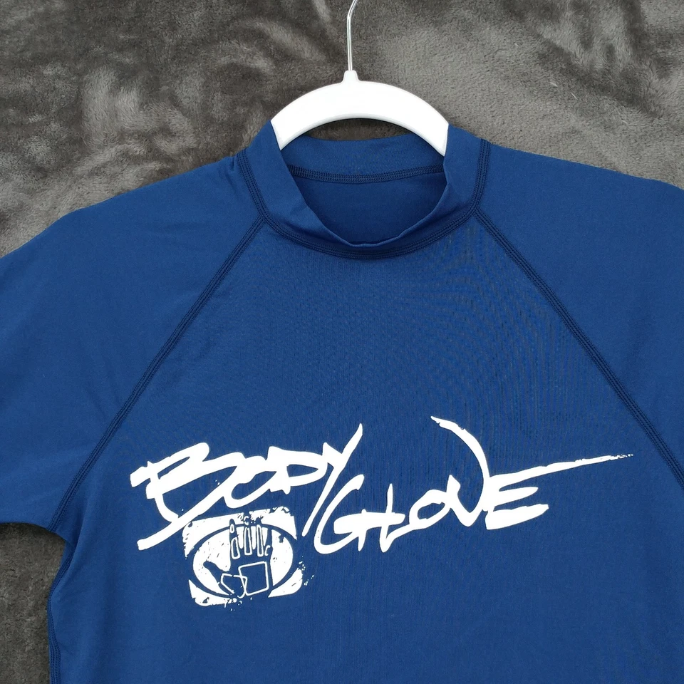 Body Glove Camisa de Natación Protección contra Erupciones Juvenil Medio Azul Manga Corta Protección UV Foto 2 de 4