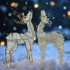 Set of two Buck Raindeer Figurines White Seaglass and Gold Tone Frame 11-1/2"