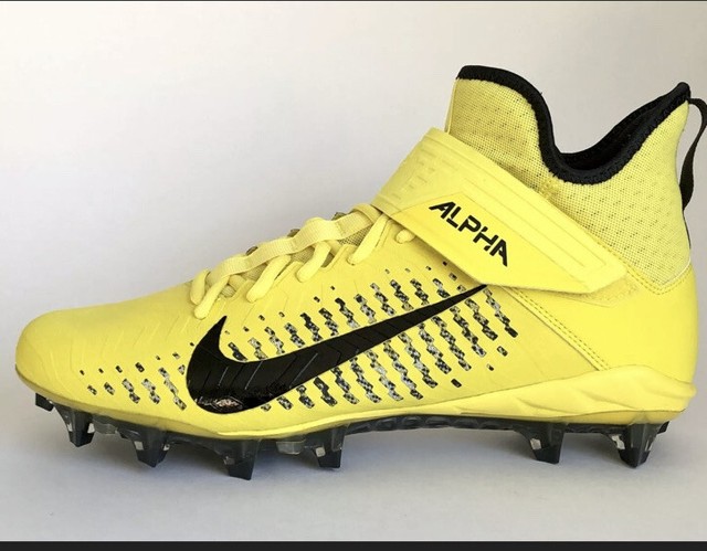 alpha football cleats