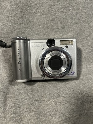 Vintage Canon PowerShot A80 4.0MP Flip Screen Digital Camera Silver Untested