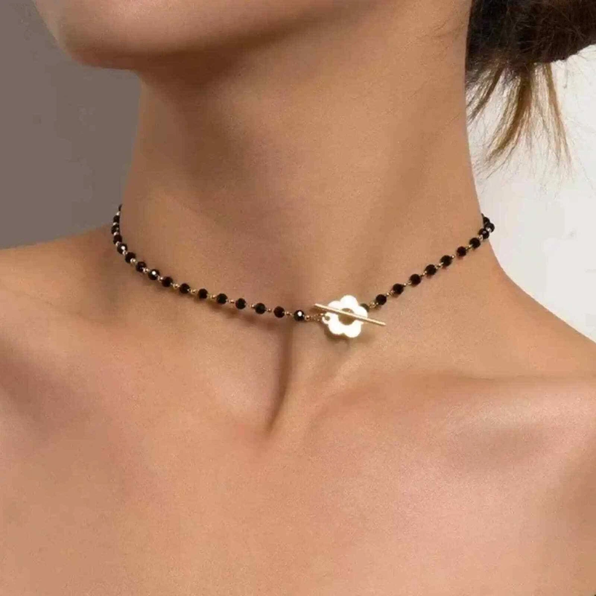 RESTOCK Black onyx and gold choker necklace w flower & bar toggle closure