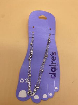 Claires Zubehör 2er Set zarte silberfarbene Kugeldetail Fußkettchen Ketten