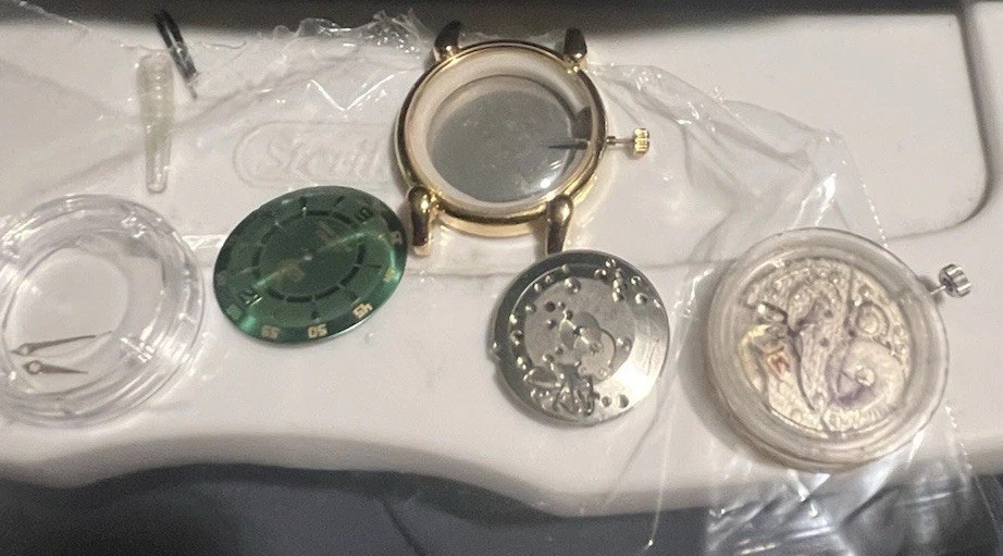 CAMY Swiss Movement,(plus case,dial,hands )Movement Runs But inconsistent.