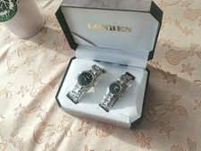 *LONBEN* Quarzuhr ungetragene Partner Armbanduhren. Stainles Steel,Batterie leer