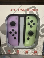 Switch Joy Cons left and a right Nintendo Shock Vibrate Purple Green New In Box!