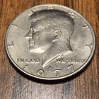 1977 JFK Half Dollar Error Coin On E  In Liberty And Two Different 7’s In 1977.