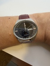 VINTAGE RADO STARFIRE AUTOMATIC STAINLESS STEEL VINTAGE OVAL CASE BLACK DIAL.