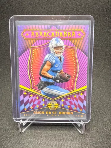 2024 Panini Illusions #13 Amon-Ra St. Brown Abracadabra Purple /50 - Lions