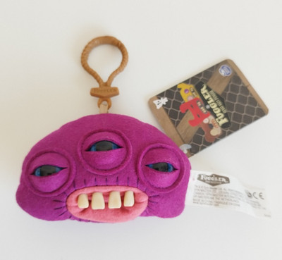 Spin Master Fuggler Annoyed Alien lila Taschenclip/Schlüsselanhänger Serie 1