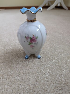 vintage four footed perfume bottle/vase very unique