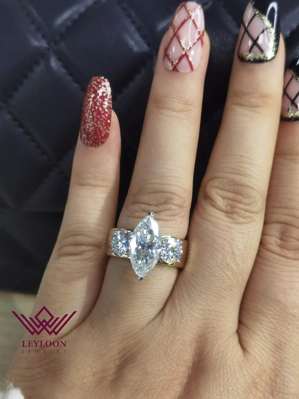 8*16mm Marquise Cut Three-Stone G-H Color 14K Two-Tone Moissanite Ring