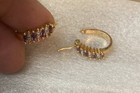 PAJ BB Signed Diamond Chip Purple Glass Goldtone 3/4" Hoop Click Top Earrings — photo 1