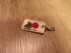 COLLECTIBLE LUCITE ROSE GREGORY SOUTH DAKOTA KEY CHAIN