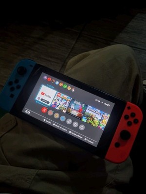 Nintendo Switch, in amazing condition, used 3 times and will come with dock