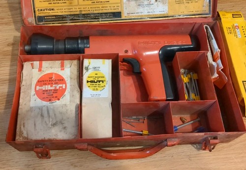 Hilti DX-350 Powder Actuated Fastening Tool Kit W/ Case includes some hardware.