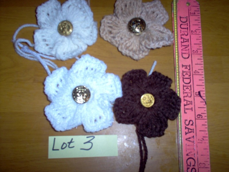 Hand crafted appliques. brass centers use on  knit machine hats #3a