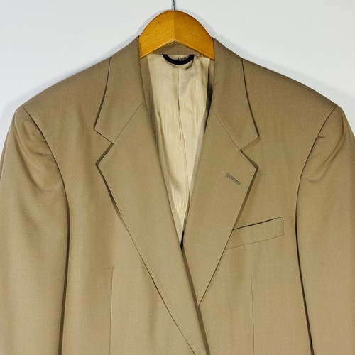 Ivory gold Austin Reed men's blazer jacket with notch lapels, front button closure, and subtle textured fabric on hanger.
