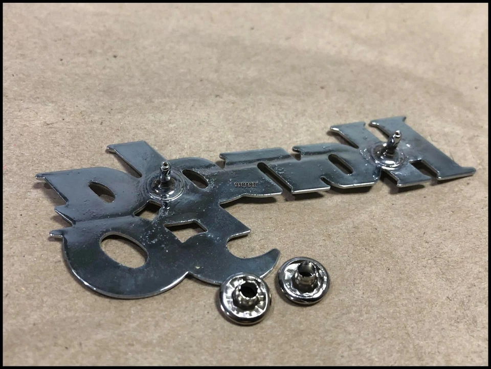 Honda 50 C100 CA100 C102 CA102 C50 emblema protector de pierna CUBIERTA DELANTERA protector de pierna NUEVO Foto 2 de 3