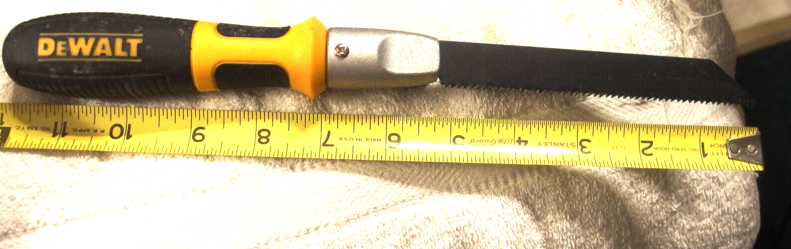 Dewalt flush cut saw handle with reciprocating blade for drywall and tool cutting