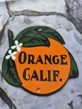 VINTAGE ORANGE CALIFORNIA JUICE PORCELAIN SIGN  7"×6"