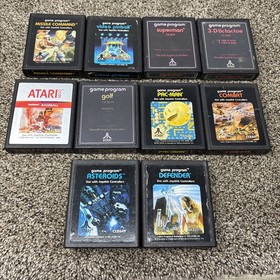 Atari 2600 System Bundle with Console, 30 Games, Joystick, Paddles, and More LOT