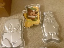 Set Of 3 Wilton Cake Pans Featuring Yogi Bear Tweety And Fred Flintstone