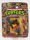 1989 Playmates Teenage Mutant Ninja Turtles - Leatherhead (Sealed Unpunched)