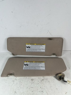 2004-2008 Toyota Solara Driver and Passenger Side Sun Visor Pair Set Tan Light