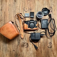 Fujifilm X-T1 + XF 18-55mm f/2.8-4 + Kaza Deluxe Leather Case - 2 Chargers