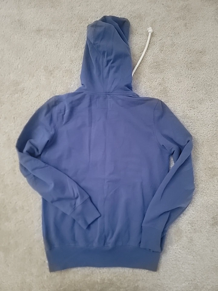 Sudadera con capucha Golden State Warriors azul marca The City 47 cremallera talla mediana para mujer Foto 3 de 3