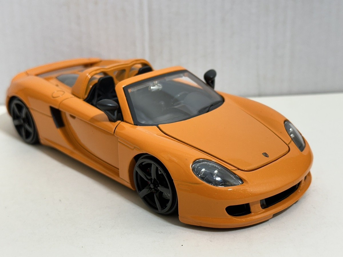 JADA BIGTIME KUSTOMS BTK 2005 PORSCHE CARRERA GT ORANGE 1:24