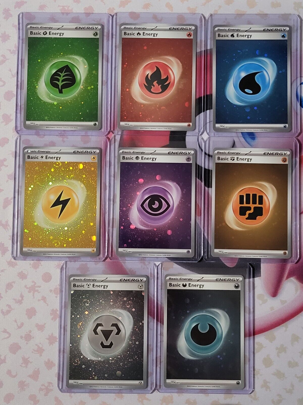 A Pokemon 45 Basic Energy Cards Collection - 5 Pieces per Variety Energy  Cards + 50 Arkero-G® Standard Soft Sleeves (Card Sleeves): : Toys