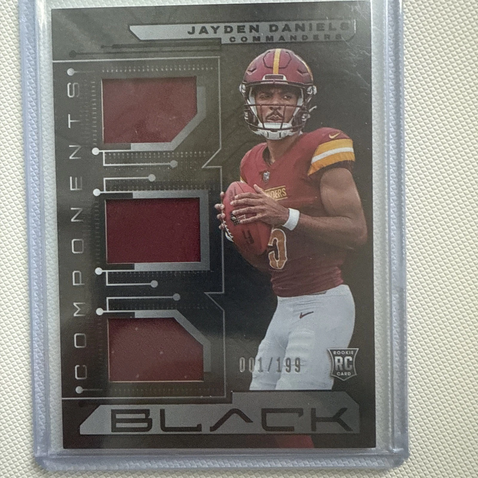 Jayden Daniels Panini Black Components Relics #CO2 Base