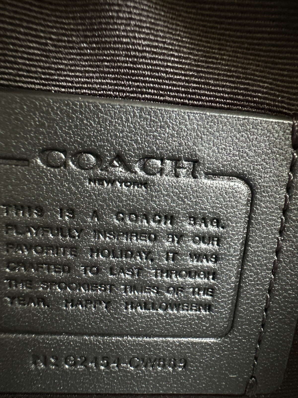 NWT COACH BLACK/MULTI HALLOWEEN SIGNATURE CORNER ZIP WRISTLET CW869