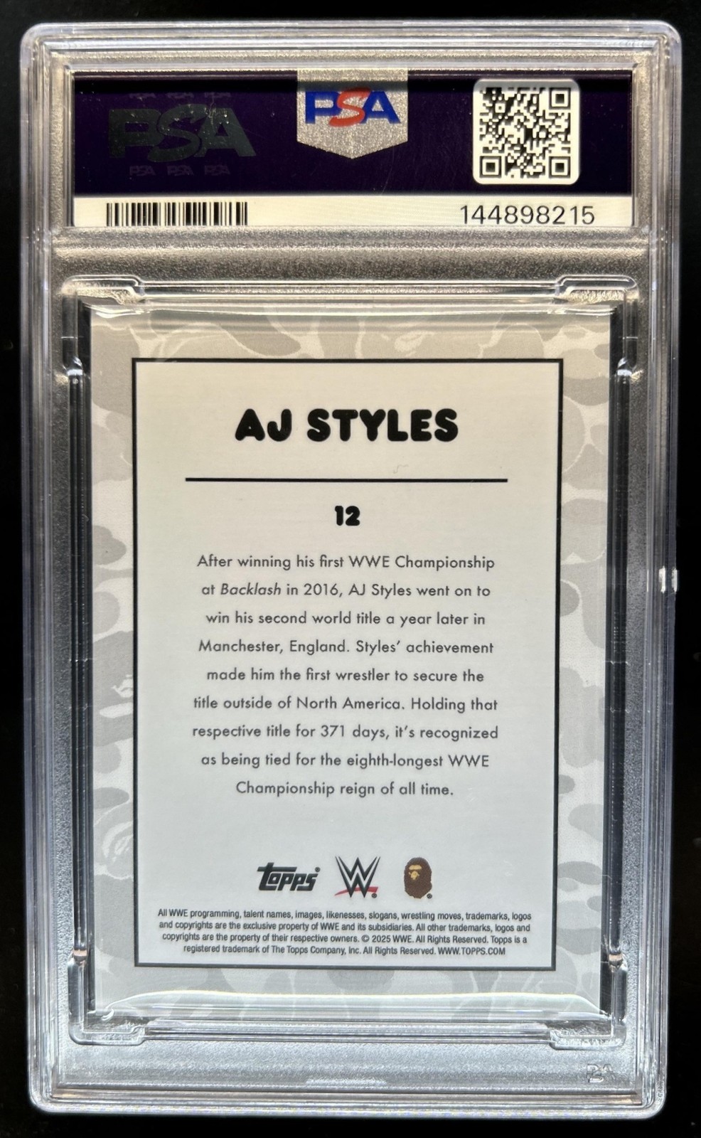 2025 Topps WWE x Bape AJ Styles Purple Camo #/75 PSA 9 view 2