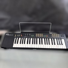 Teclado electrónico Yamaha PSR 11 con estuche de transporte