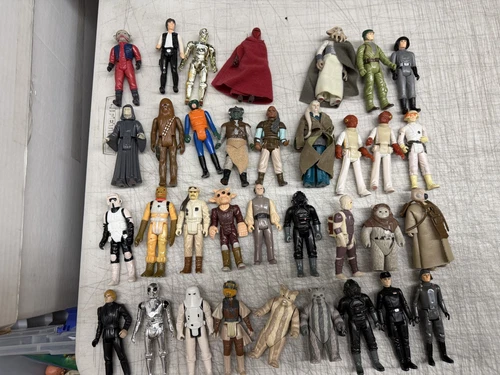 Vintage lot of 34 Star Wars figures Luke Han Solo Ewoks Bounty Hunters