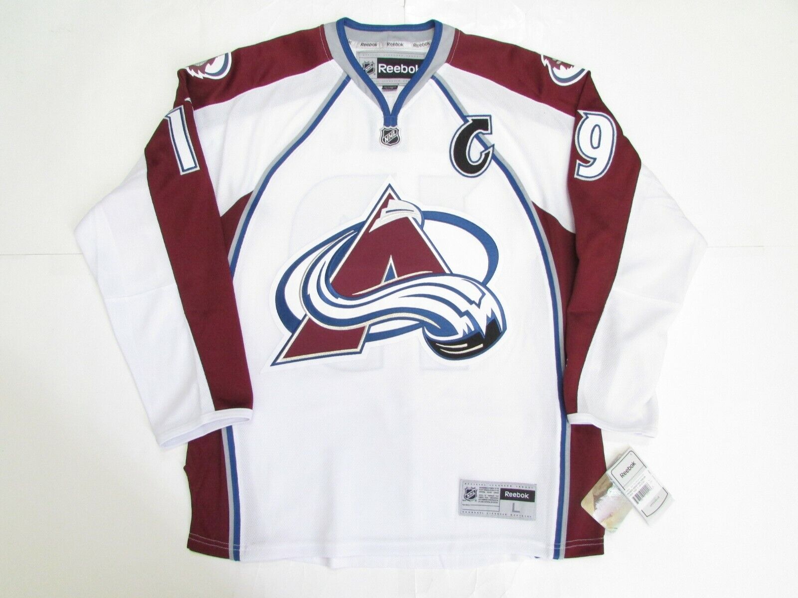 JOE SAKIC COLORADO AVALANCHE HOME PREMIER REEBOK NHL JERSEY