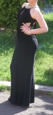 Gorgeous Black and Gold Prom Dress size 8 but stretchy material