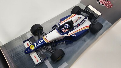 Miniature Quartzo 1/18 Williams FW17 - David Coulthard, Vainqueur GP Portugal 1995