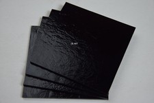 0100.50- 4 - 2" x 2" PIECES OF BLACK BULLSEYE 2mm THIN GLASS 90 COE FUSIBLE