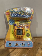 Vintage Tamagotchi Connection V4 giallo sigillato in fabbrica Ban Fair 2006