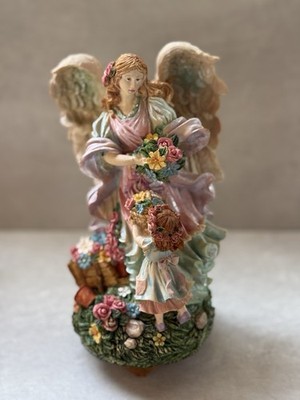Vintage Painted Resin Angel With Child Figurine, music box, mechanical