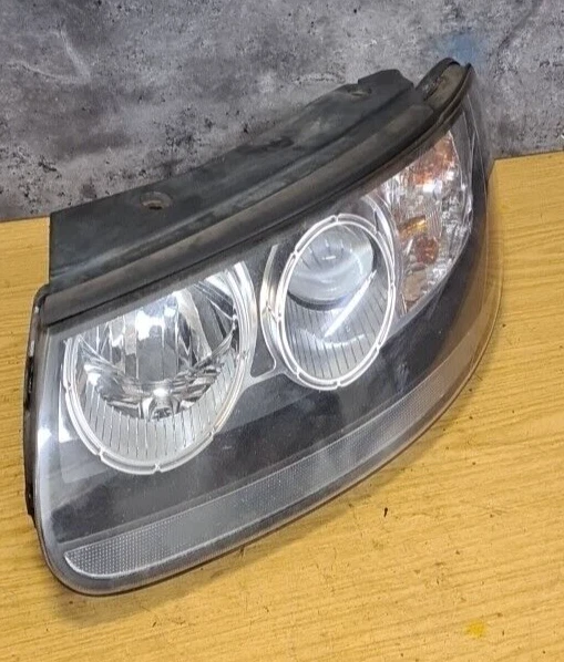 Faro lateral del pasajero Hyundai Santa Fe MK2 2011 92101-2B0 Foto 2 de 4