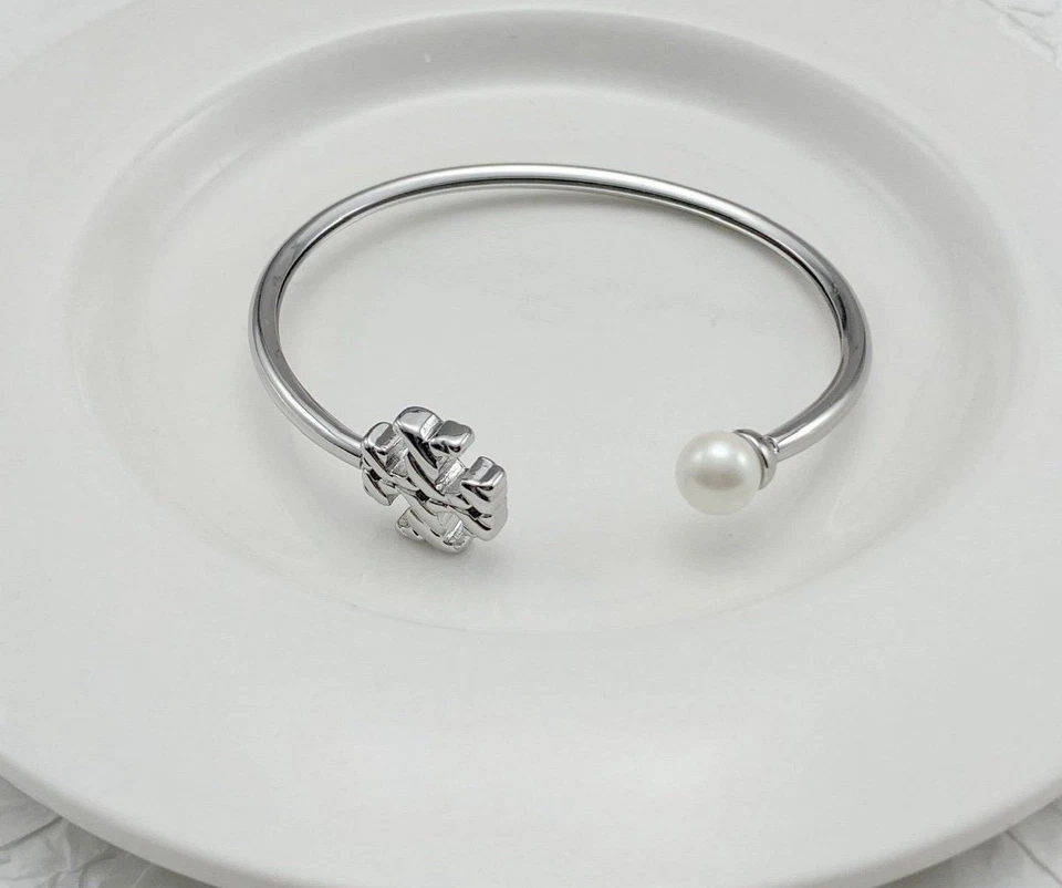 Silbernes Armreif - Tory Burch verstellbar mit TB Logo