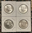 1964 KENNEDY HALF DOLLARS. A LOT OF 4 90% SILVER COINS.
