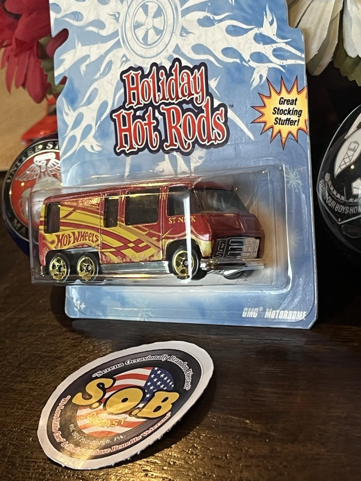 Autocaravana GMC Hot Wheels 1976 roja con llamas diecast sellada casi nueva Foto 4 de 4