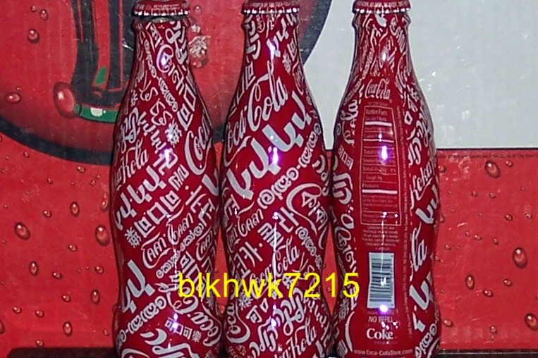 2012 WORLD OF COCA COLA MULTI - LANGUAGE LOGO'S 8OZ COCA - COLA