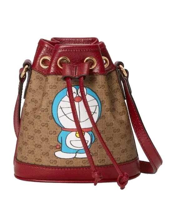 Gucci x Doraemon mini sac seau GG suprême monogramme toile enduite manga