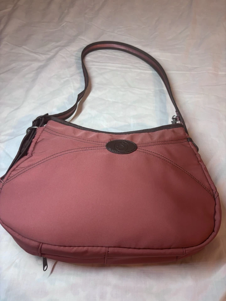 Bolso de hombro Pacsafe Citysafe antirrobo para mujer - naranja quemado Foto 3 de 4